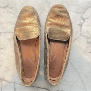Sseko Designs gold loafers